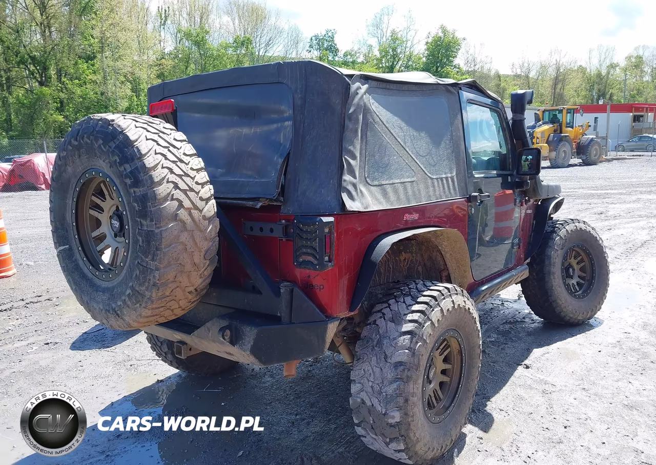 2011 Jeep Wrangler Sport VIN:1J4AA2D19BL569571 - 4