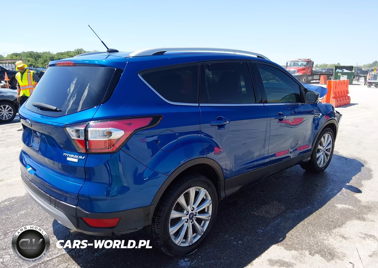 2017 Ford Escape Titanium VIN:1FMCU0J98HUC78935 - 4