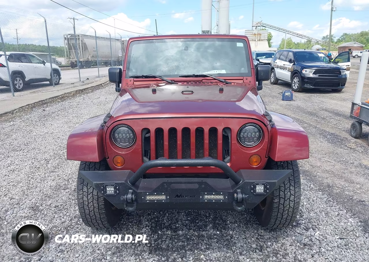 2009 Jeep Wrangler Unlimited Sahara VIN:1J4GA59159L770754 - 12