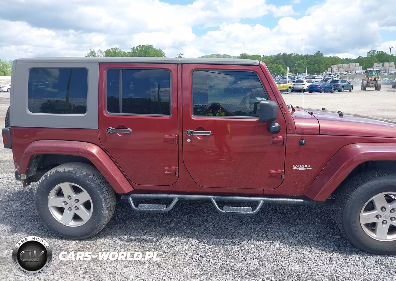 2009 Jeep Wrangler Unlimited Sahara VIN:1J4GA59159L770754 - 13