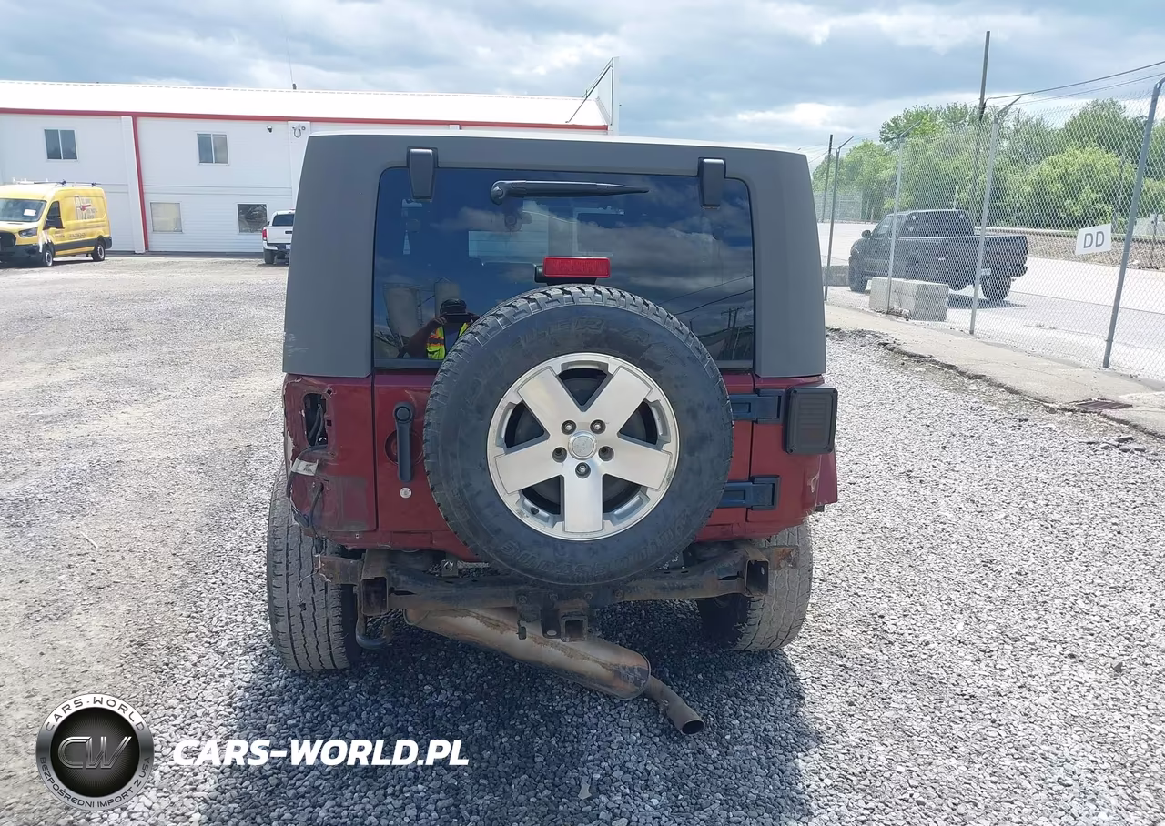 2009 Jeep Wrangler Unlimited Sahara VIN:1J4GA59159L770754 - 16