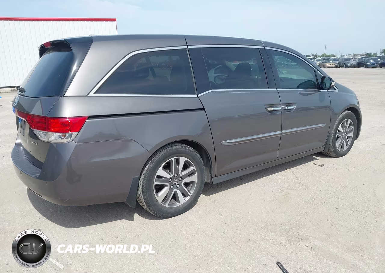 2014 Honda Odyssey Touring-Touring Elite VIN:5FNRL5H93EB111679 - 4