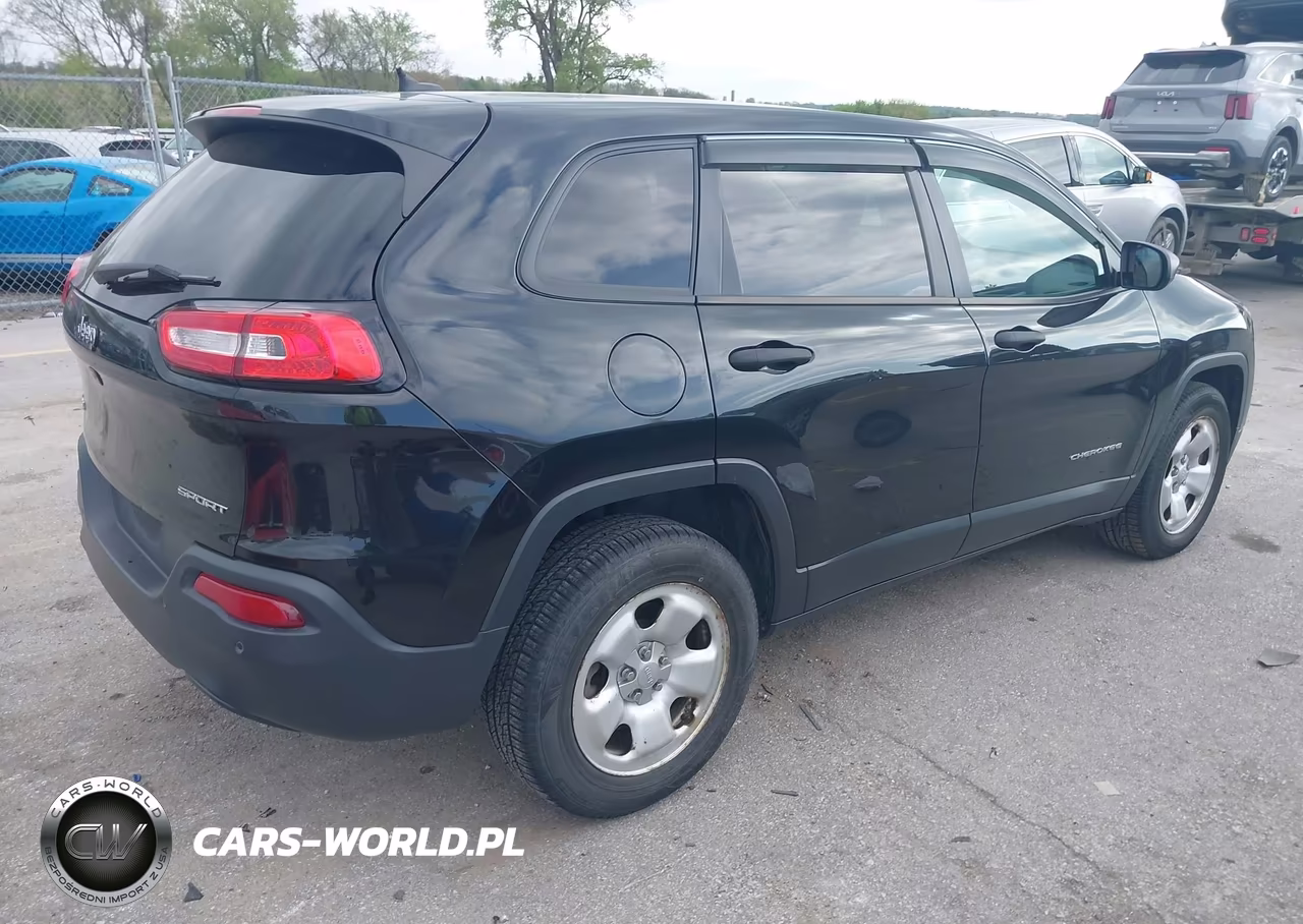 2015 Jeep Cherokee Sport VIN:1C4PJMABXFW672561 - 4