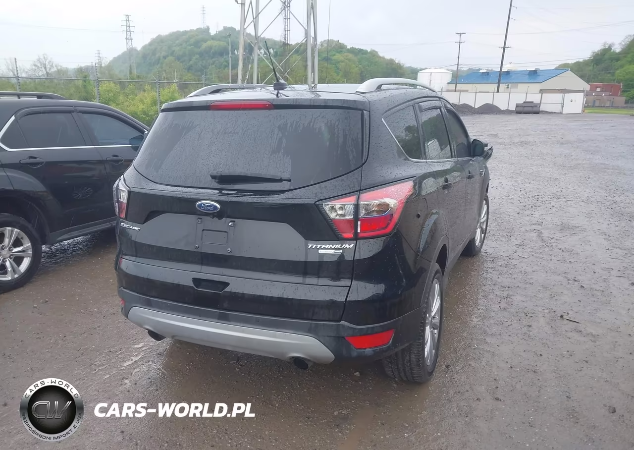 2017 Ford Escape Titanium VIN:1FMCU9JD9HUC05968 - 4