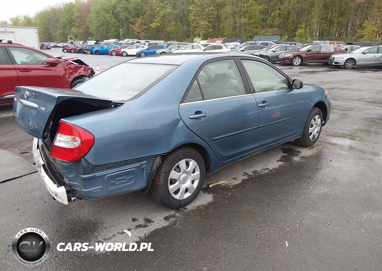 2003 Toyota Camry Le VIN:JTDBE32K830234160 - 4
