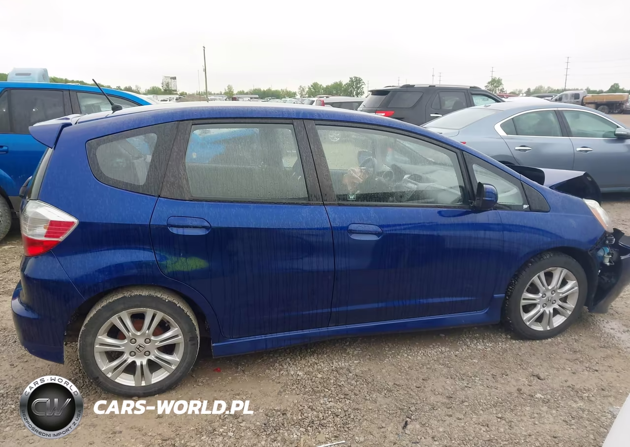 2011 Honda Fit Sport VIN:JHMGE8H5XBC024126 - 13