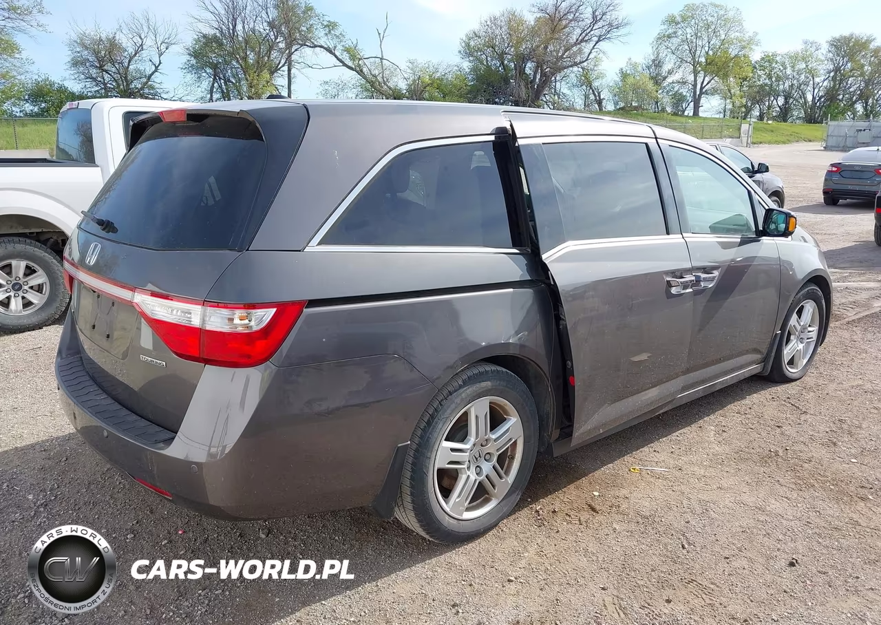2011 Honda Odyssey Touring-Touring Elite VIN:5FNRL5H91BB049940 - 4