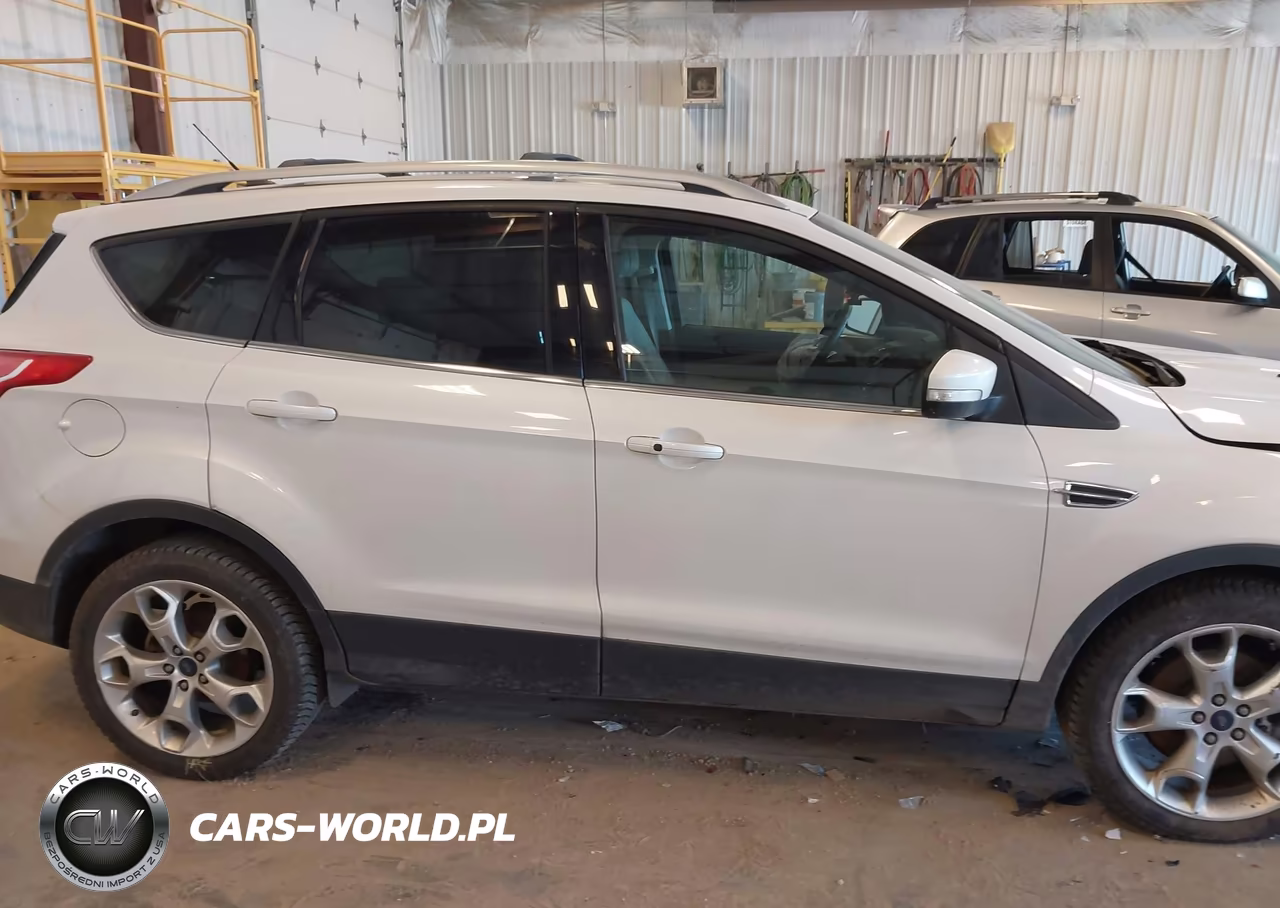 2016 Ford Escape Titanium VIN:1FMCU9J92GUB35529 - 13