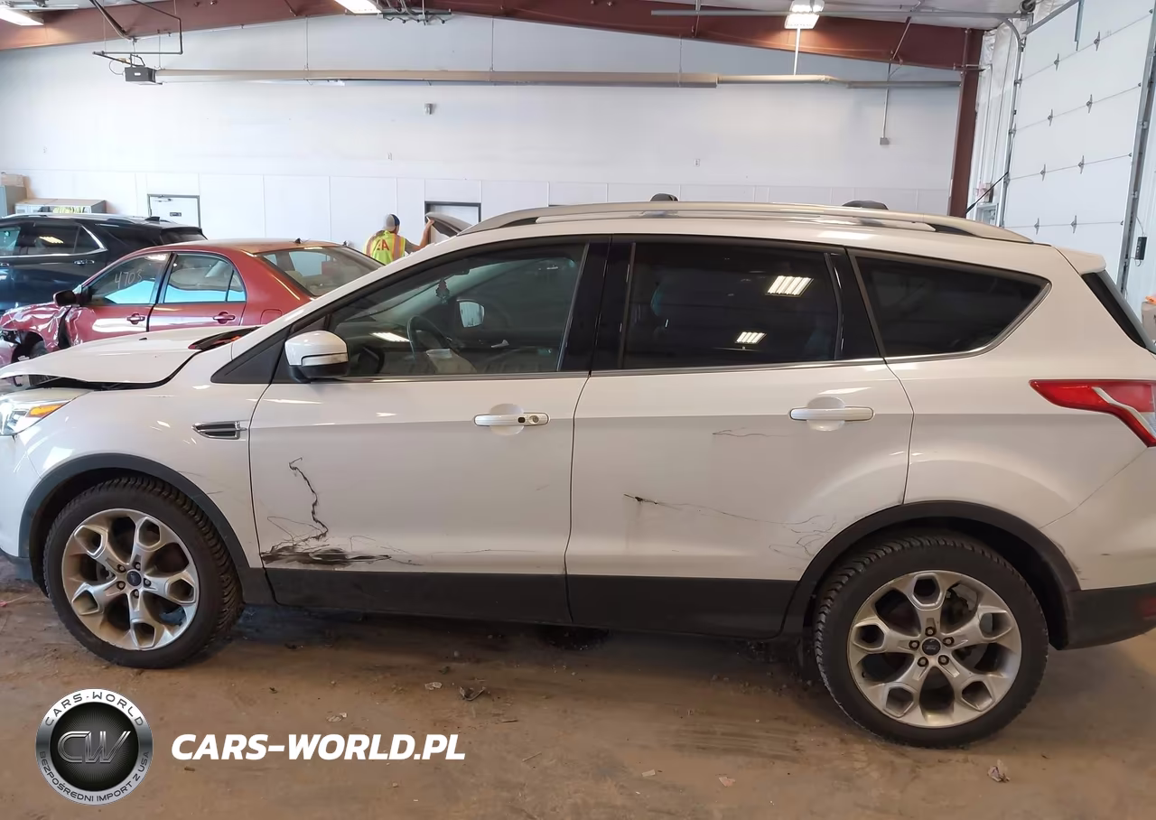 2016 Ford Escape Titanium VIN:1FMCU9J92GUB35529 - 14