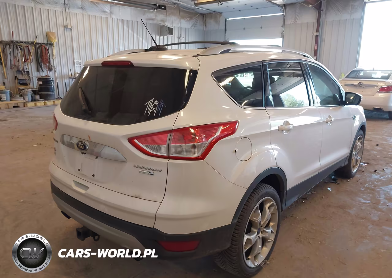 2016 Ford Escape Titanium VIN:1FMCU9J92GUB35529 - 4