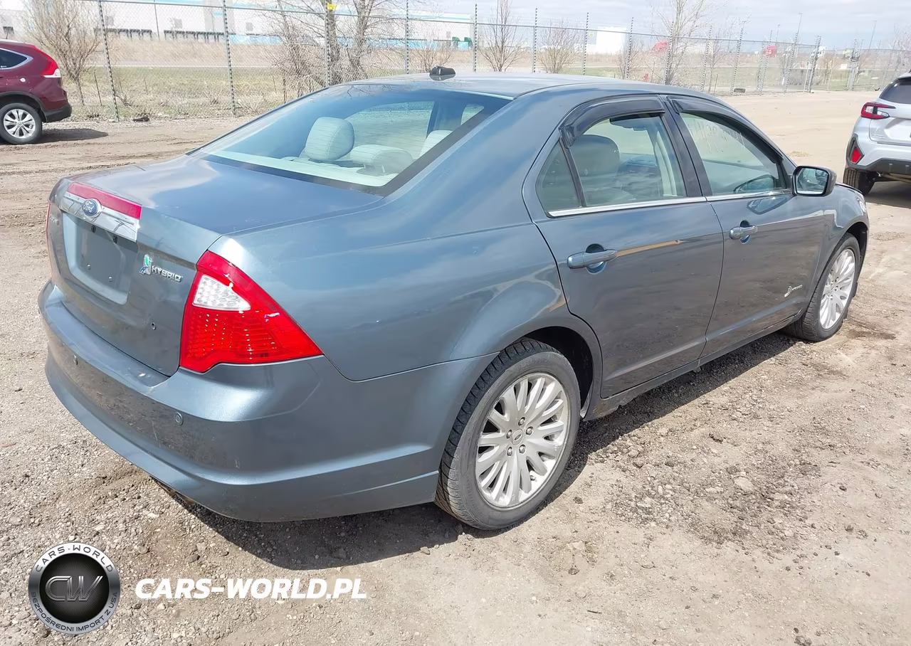 2011 Ford Fusion Hybrid VIN:3FADP0L32BR264557 - 4