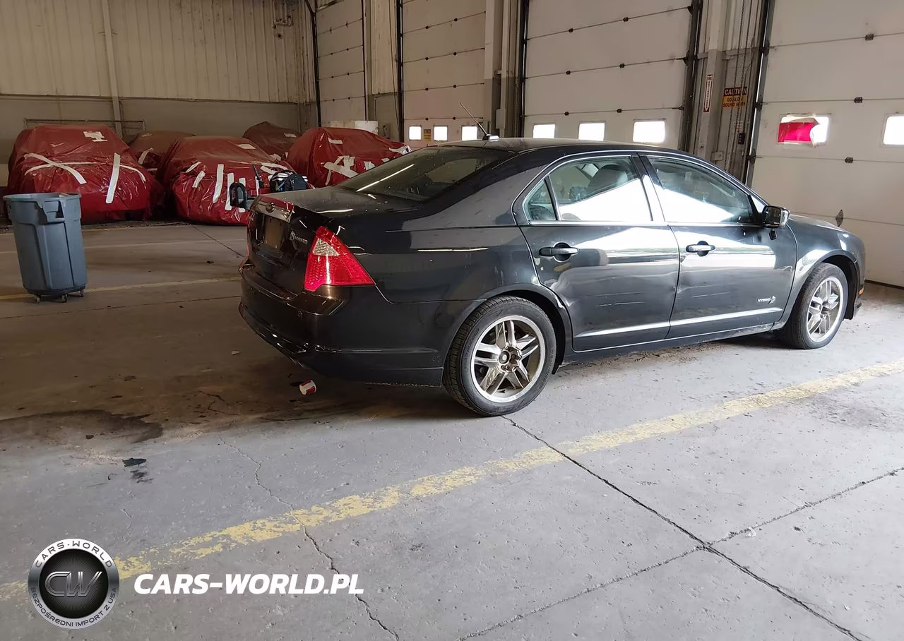 2010 Ford Fusion Hybrid VIN:3FADP0L32AR308040 - 4