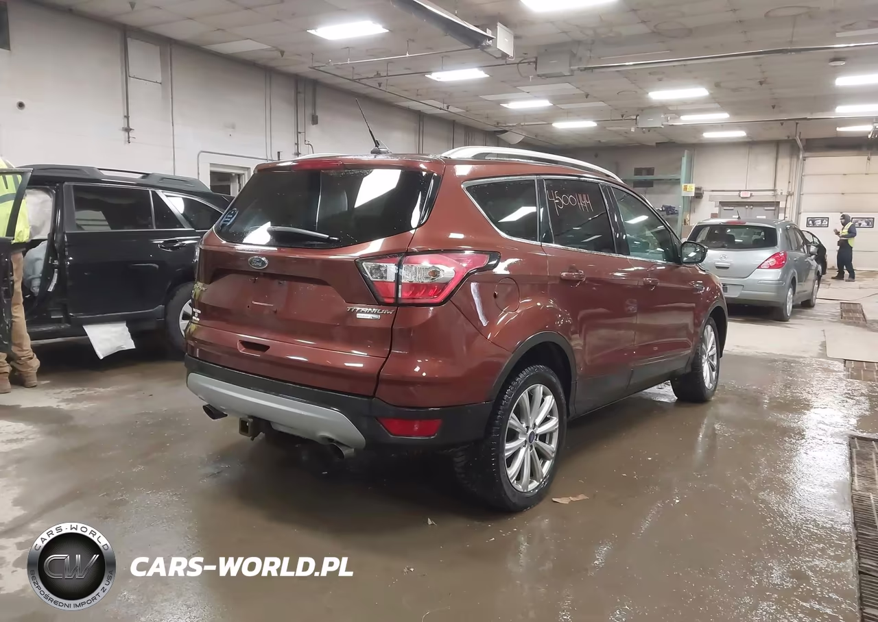 2018 Ford Escape Titanium VIN:1FMCU9J99JUC24585 - 4