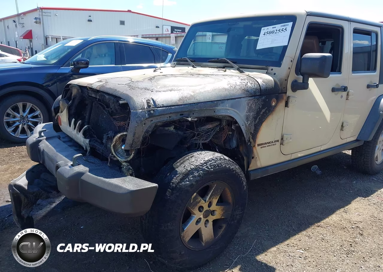 2011 Jeep Wrangler Unlimited Rubicon VIN:1J4BA6H13BL573752 - 12