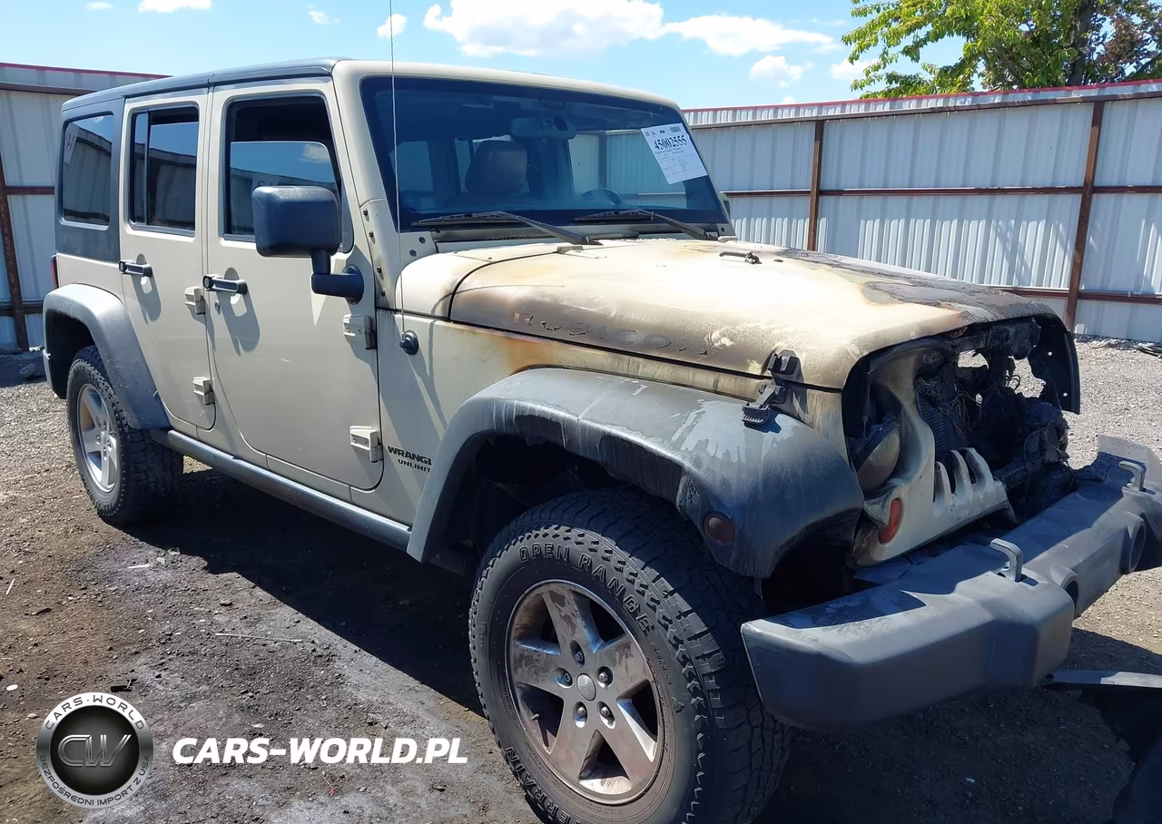 2011 Jeep Wrangler Unlimited Rubicon VIN:1J4BA6H13BL573752 - 14