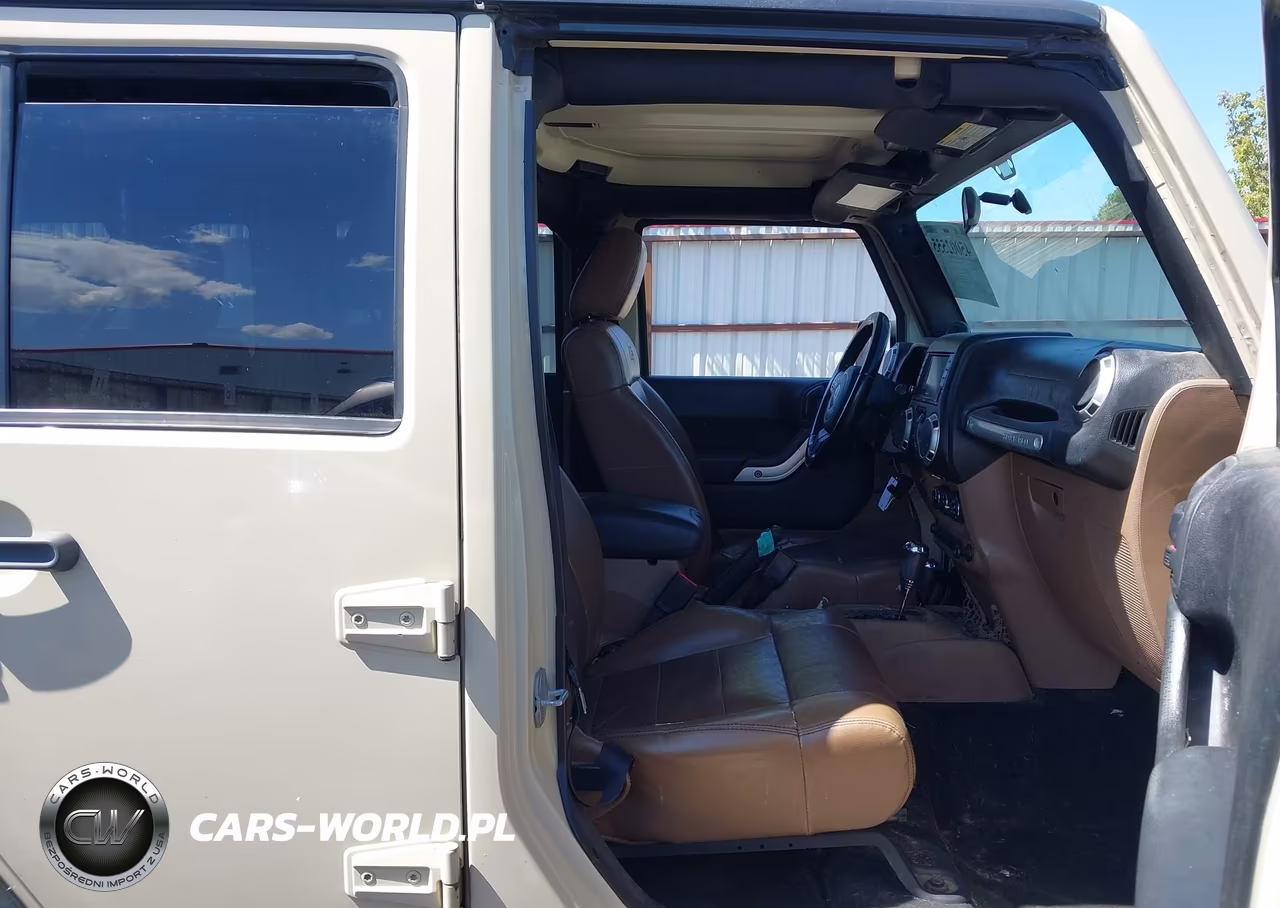 2011 Jeep Wrangler Unlimited Rubicon VIN:1J4BA6H13BL573752 - 5