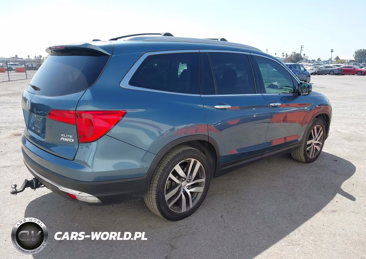 2016 Honda Pilot Elite VIN:5FNYF6H02GB040620 - 4
