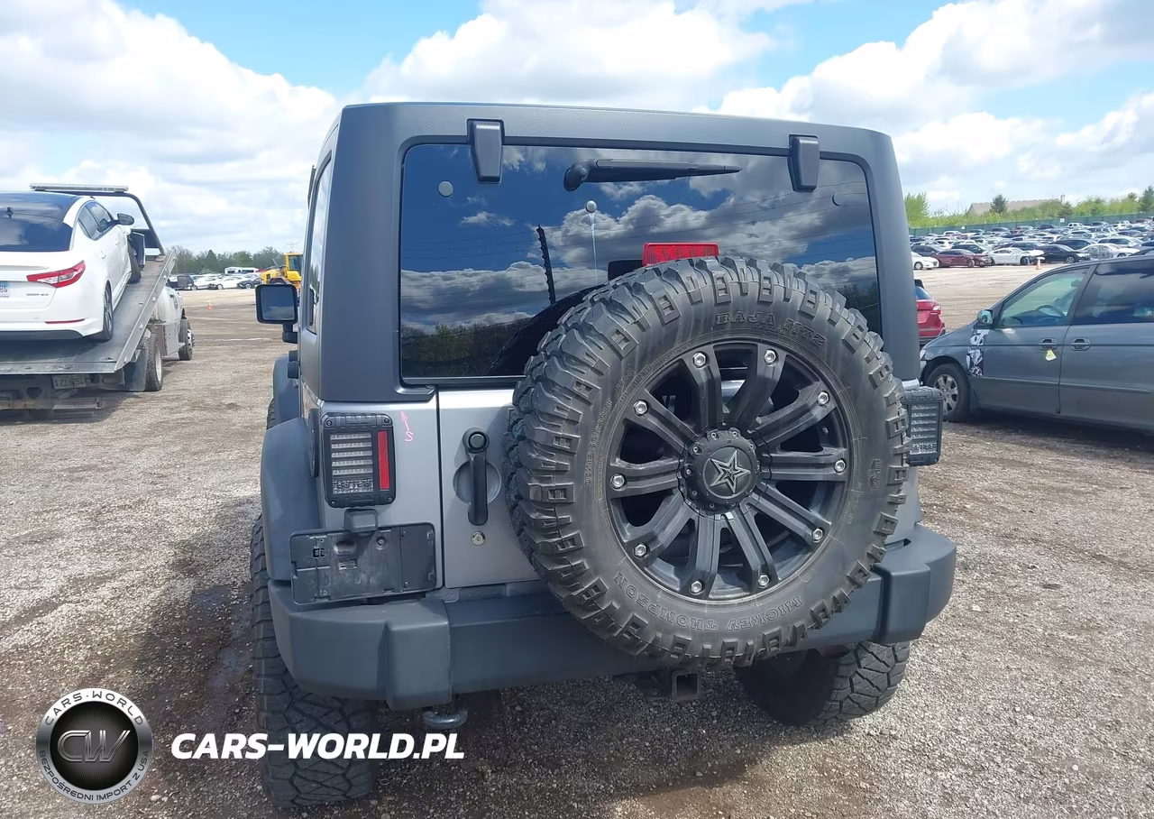 2014 Jeep Wrangler Unlimited Sport VIN:1C4BJWDG8EL155627 - 16