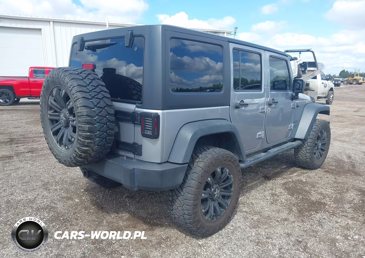2014 Jeep Wrangler Unlimited Sport VIN:1C4BJWDG8EL155627 - 4