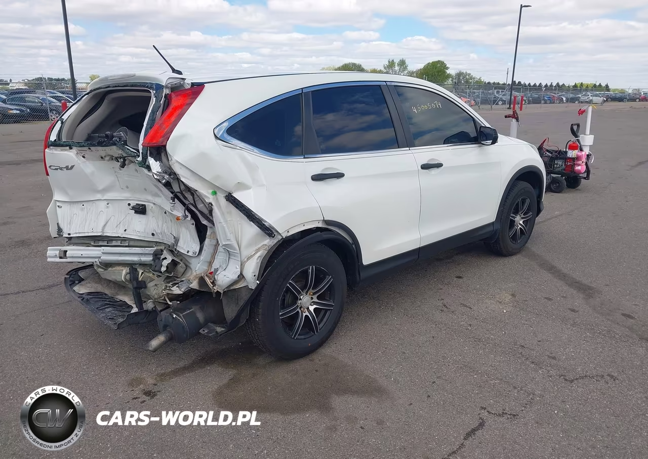 2014 Honda Cr-V Lx VIN:5J6RM3H3XEL027105 - 4