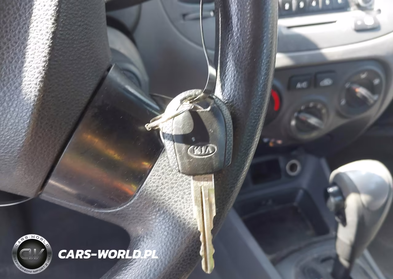 2009 Kia Rio Lx VIN:KNADE223996509761 - 11