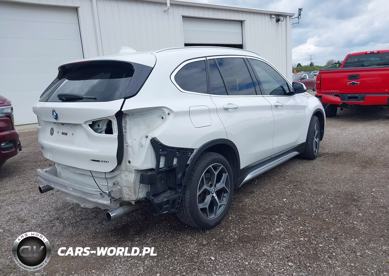 2018 BMW X1 xDrive28I VIN:WBXHT3C33J5L27601 - 4