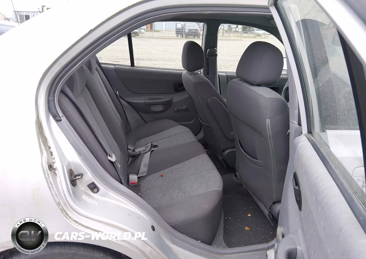 2004 Hyundai Accent Gl VIN:KMHCG45C74U561034 - 8