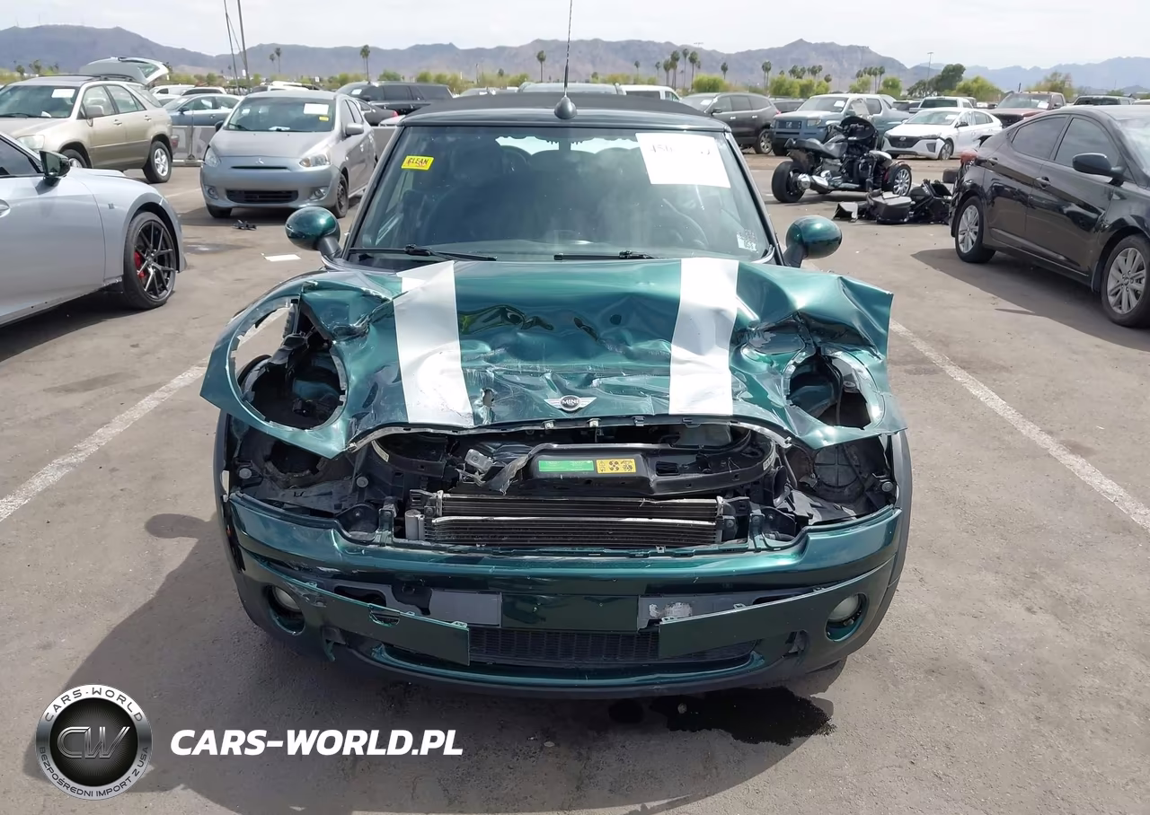 2009 Mini Cooper VIN:WMWMR33569TJ93909 - 13