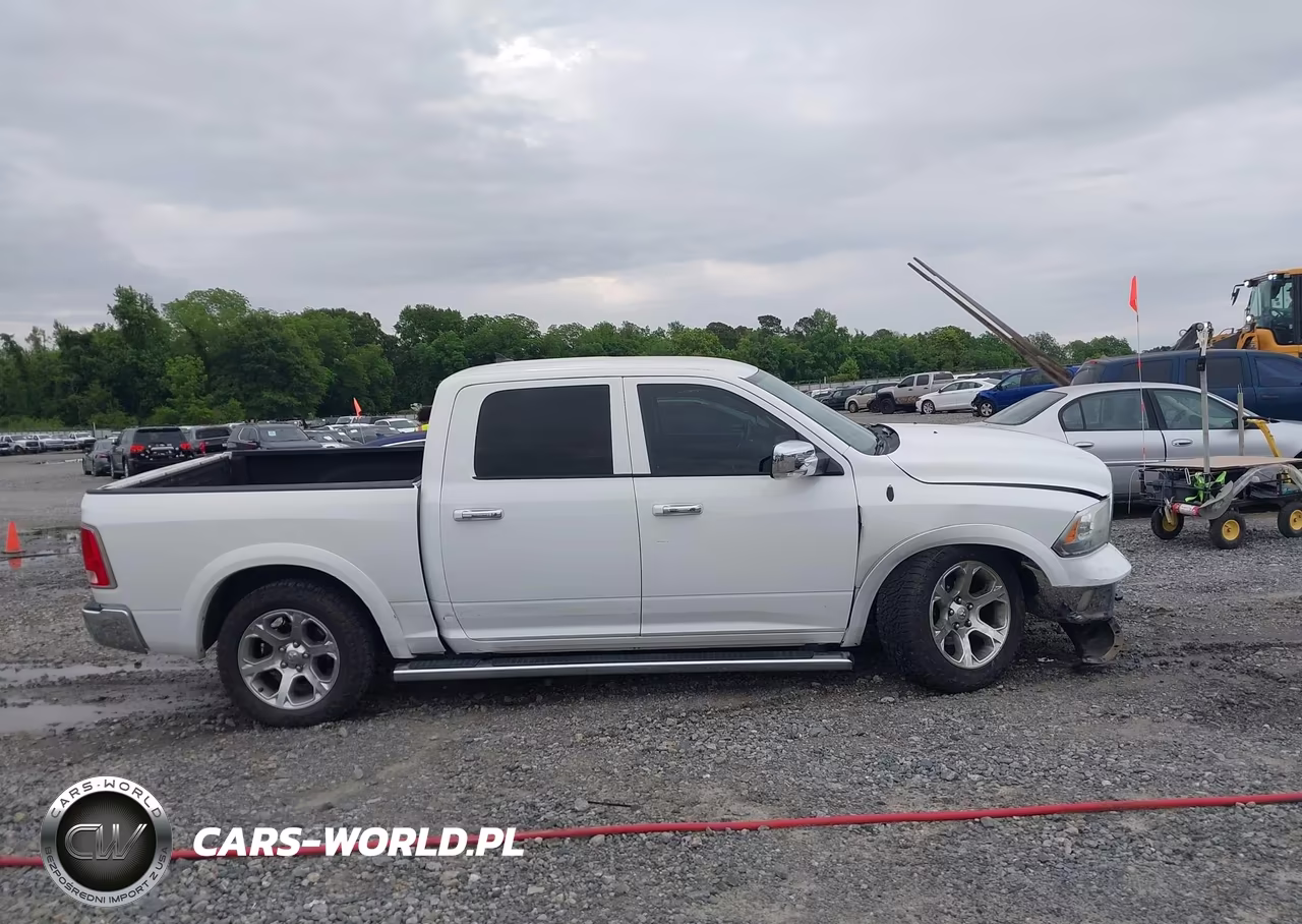 2015 Ram 1500 Laramie VIN:1C6RR7NM5FS562935 - 13