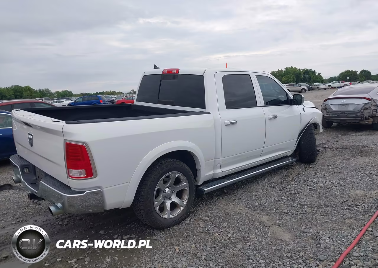 2015 Ram 1500 Laramie VIN:1C6RR7NM5FS562935 - 4