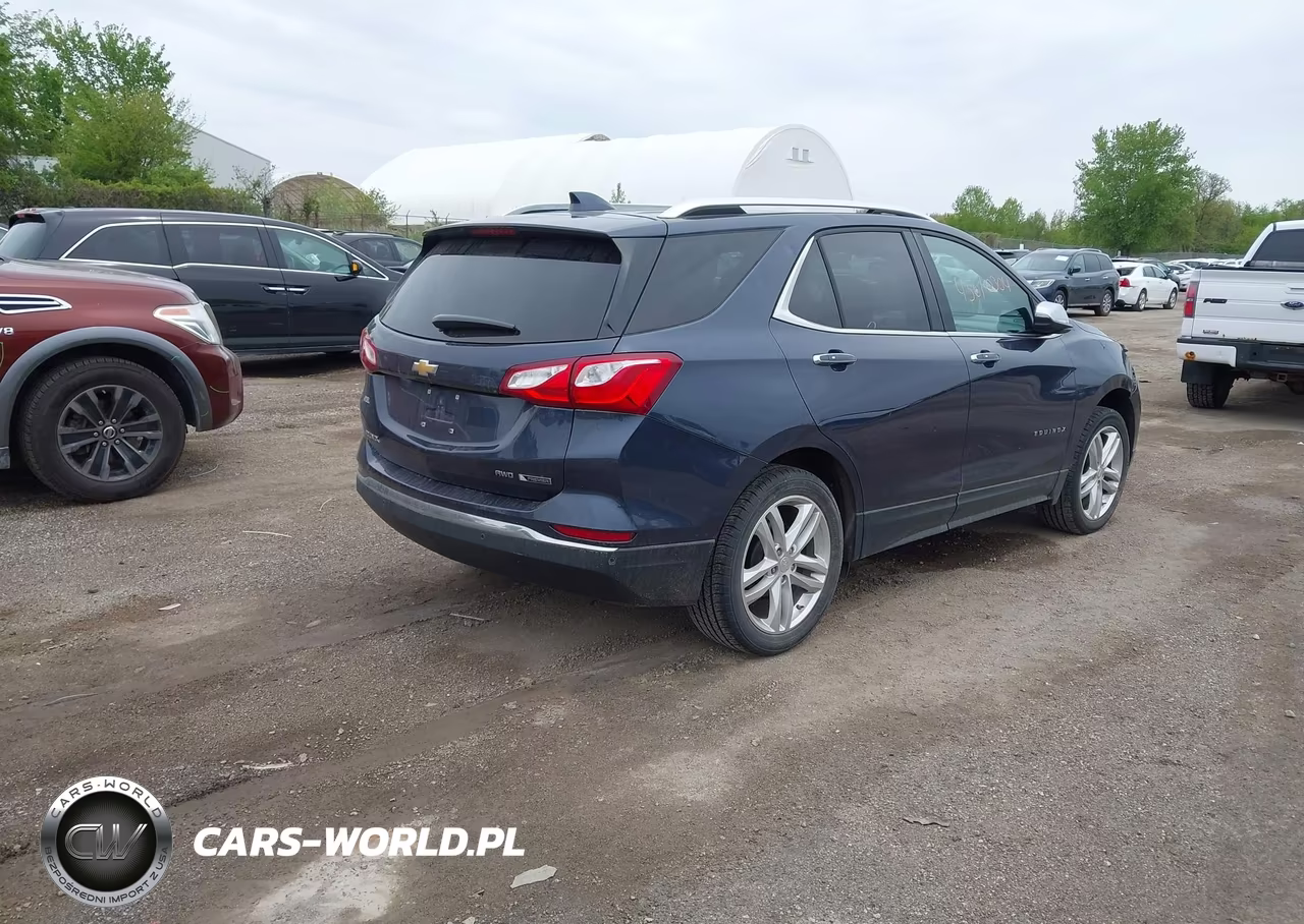 2018 Chevrolet Equinox Premier VIN:3GNAXVEV3JL384529 - 4