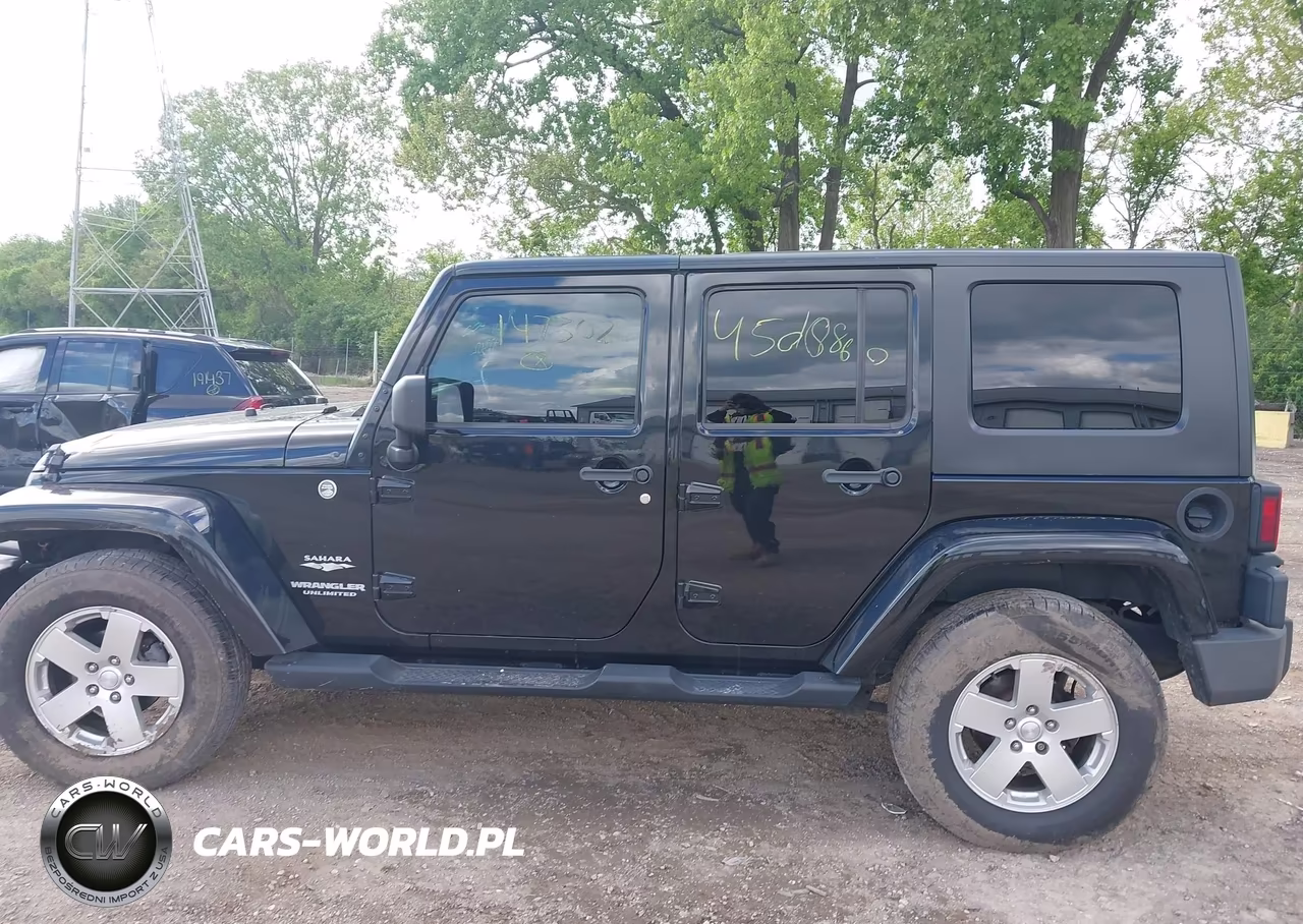 2010 Jeep Wrangler Unlimited Sahara VIN:1J4BA5H10AL147302 - 14