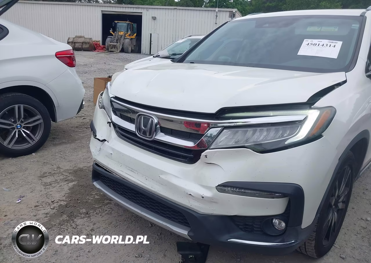 2019 Honda Pilot Touring VIN:5FNYF5H90KB018150 - 6