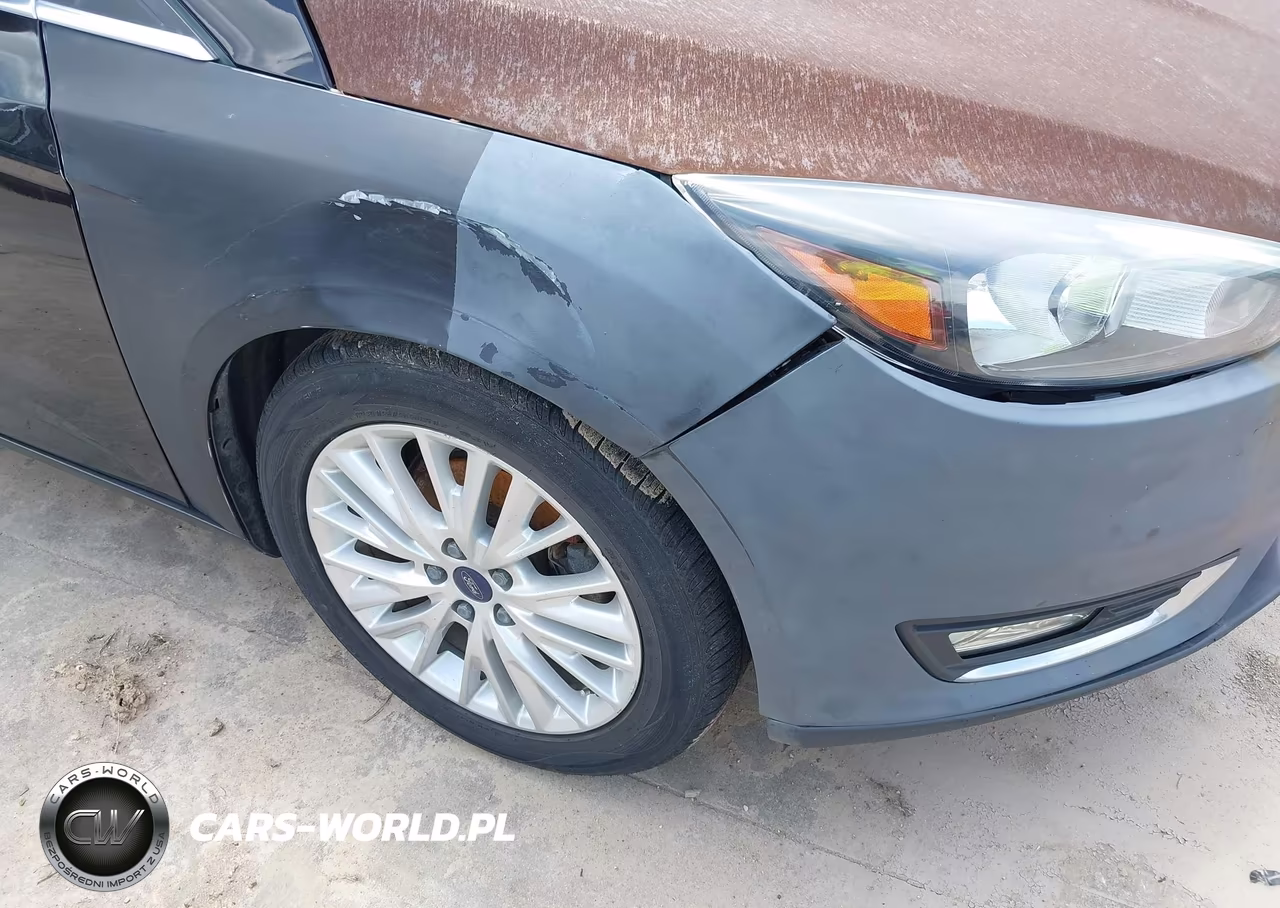 2016 Ford Focus Titanium VIN:1FADP3J28GL237168 - 12