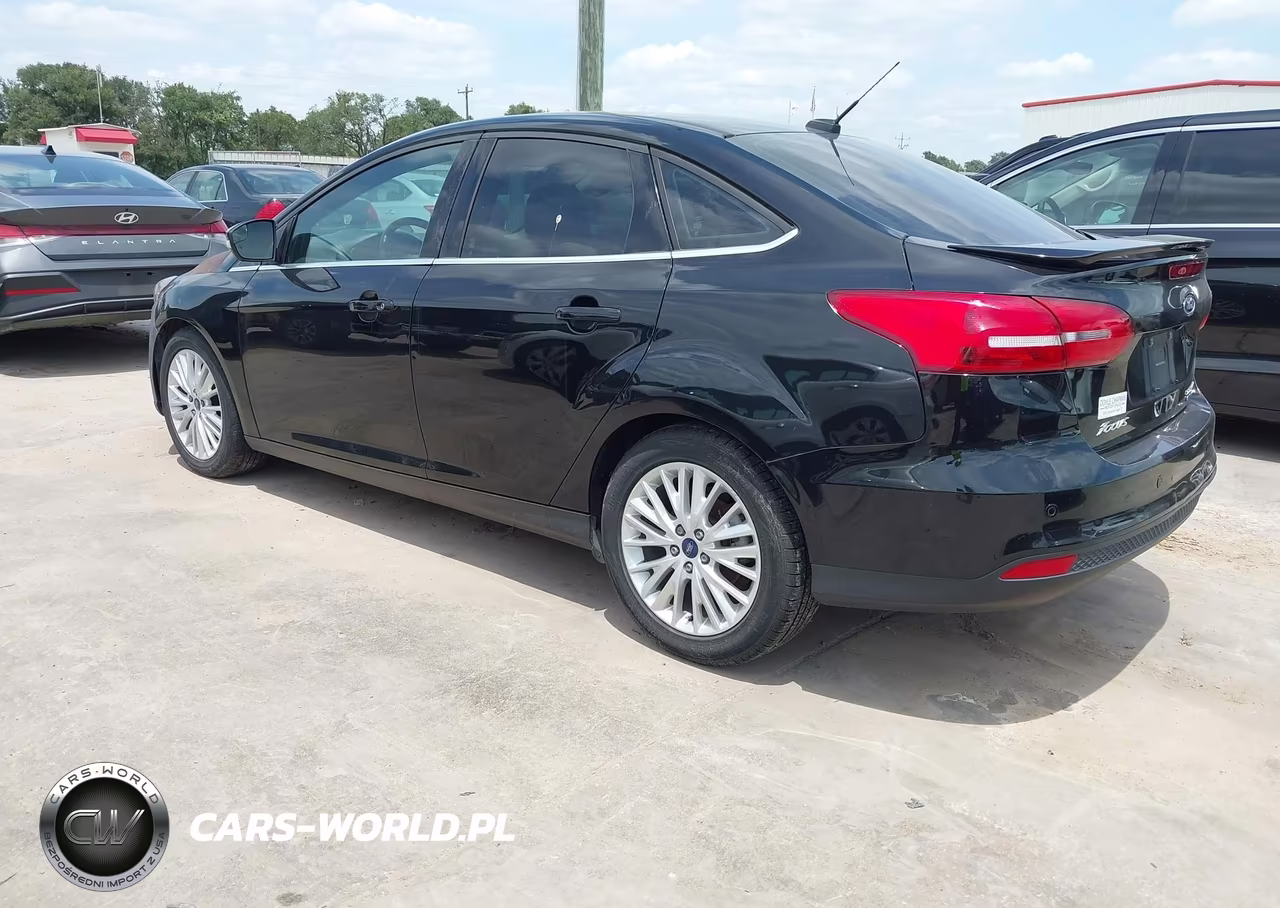2016 Ford Focus Titanium VIN:1FADP3J28GL237168 - 3