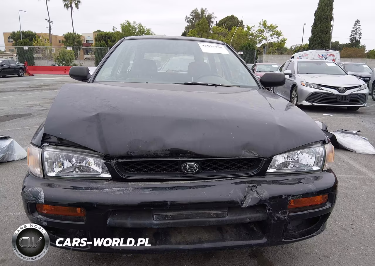 1999 Subaru Impreza L VIN:JF1GF4359XH808523 - 12