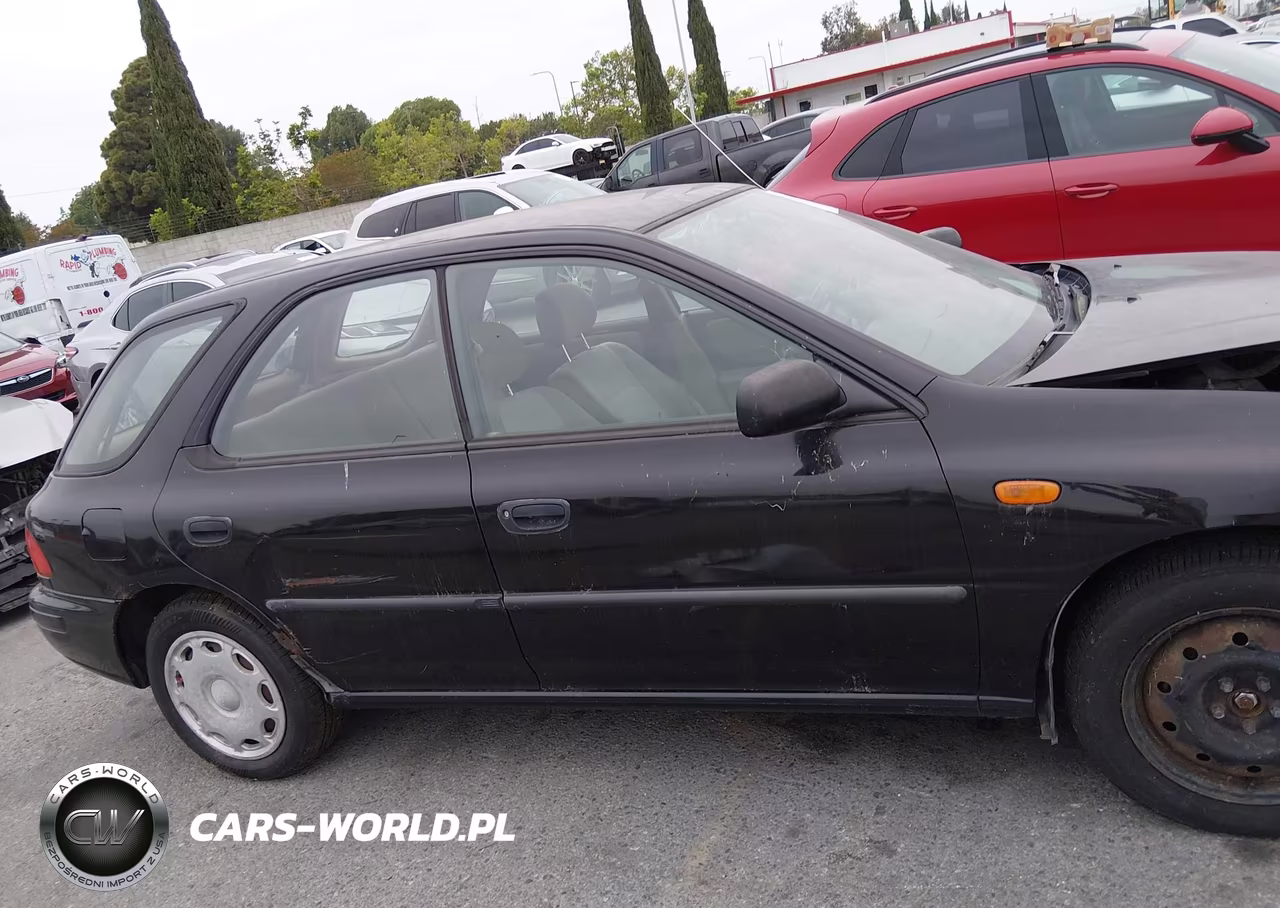 1999 Subaru Impreza L VIN:JF1GF4359XH808523 - 13