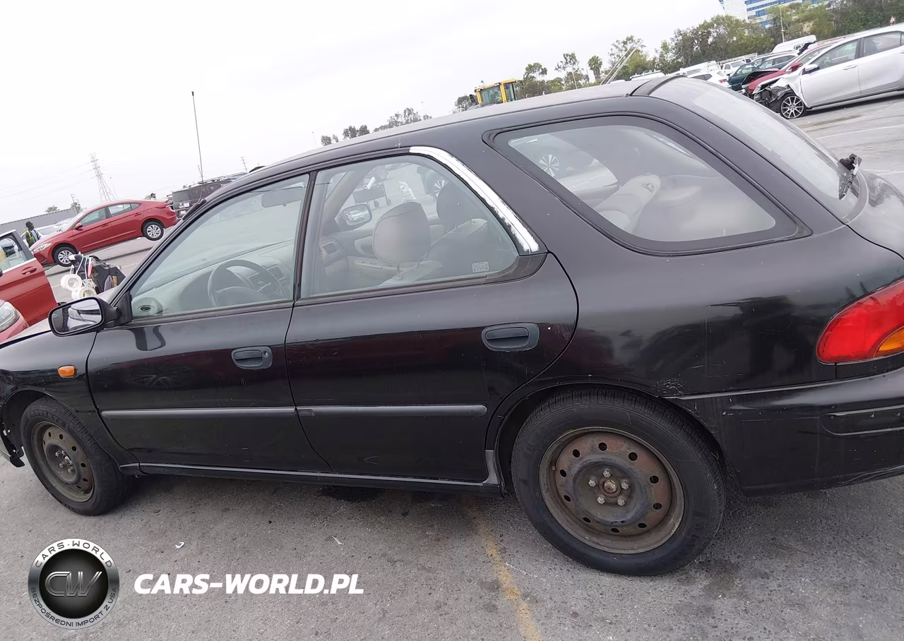 1999 Subaru Impreza L VIN:JF1GF4359XH808523 - 14