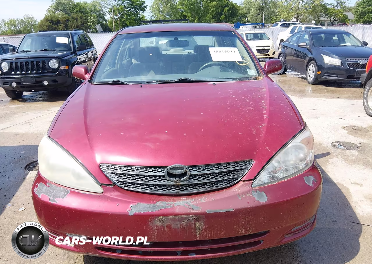 2002 Toyota Camry Le VIN:4T1BE32K92U590104 - 12