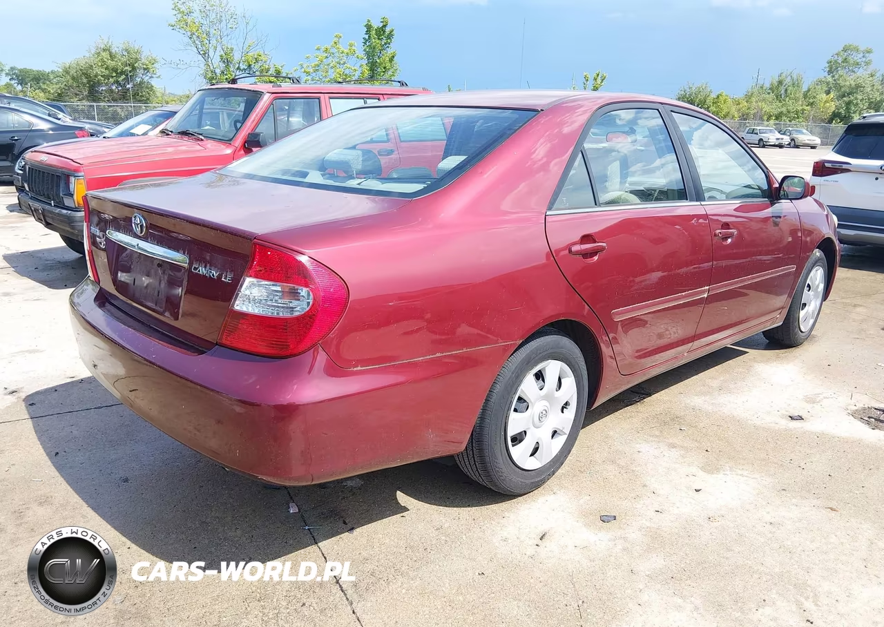 2002 Toyota Camry Le VIN:4T1BE32K92U590104 - 4