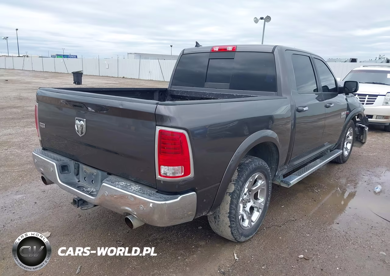 2015 Ram 1500 Laramie VIN:1C6RR6NT3FS512682 - 4