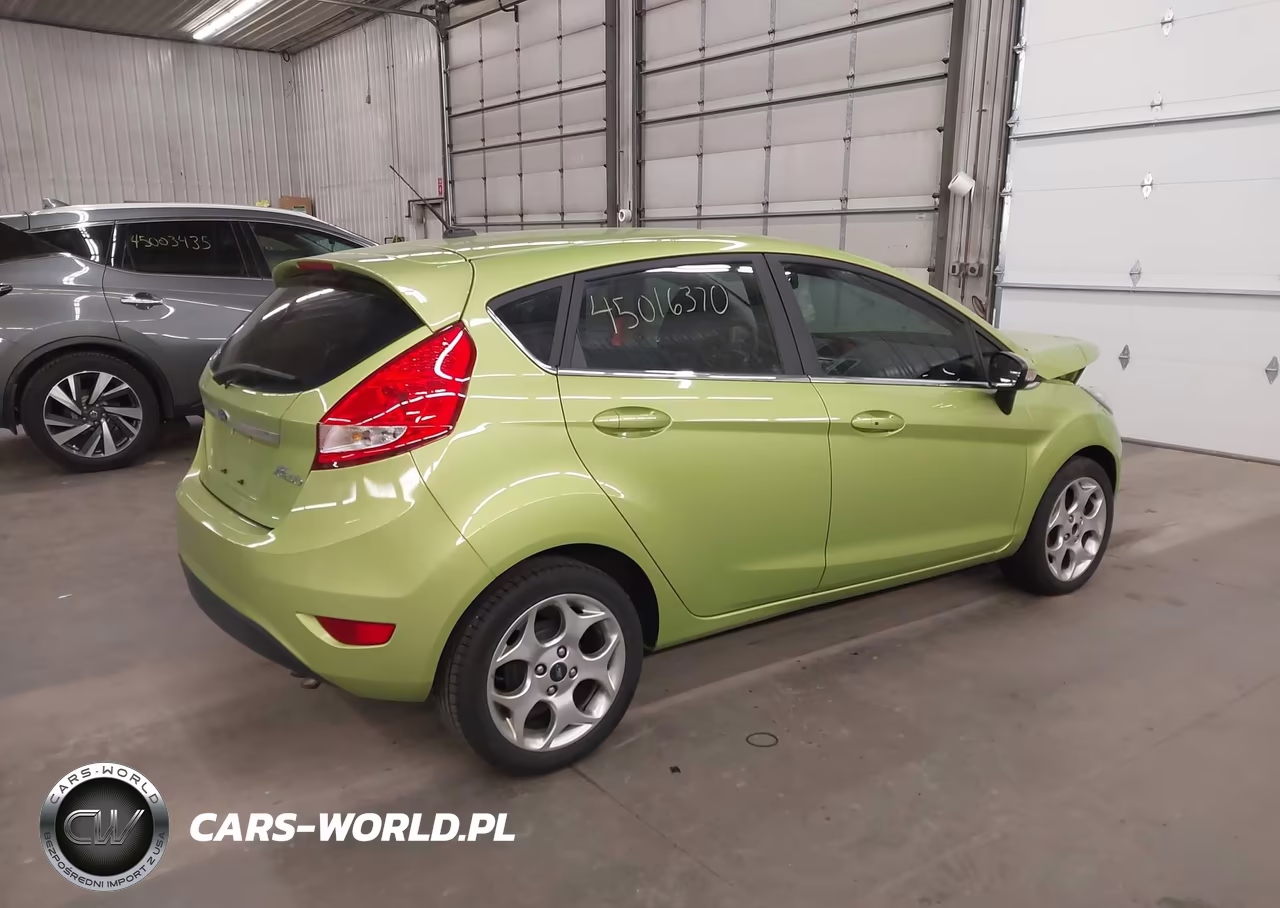 2011 Ford Fiesta Ses VIN:3FADP4FJ3BM131837 - 4