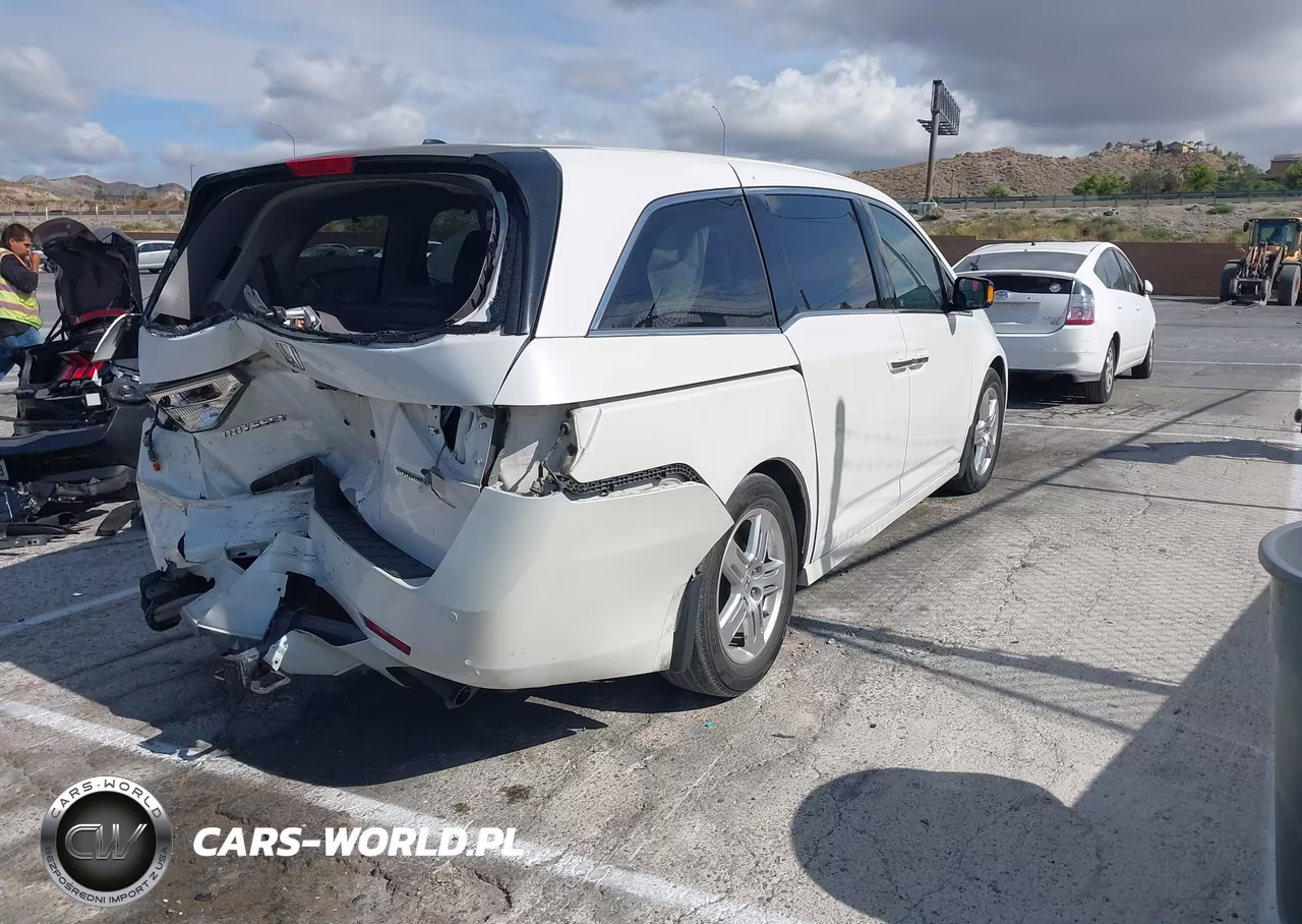 2012 Honda Odyssey Touring-Touring Elite VIN:5FNRL5H91CB079487 - 4