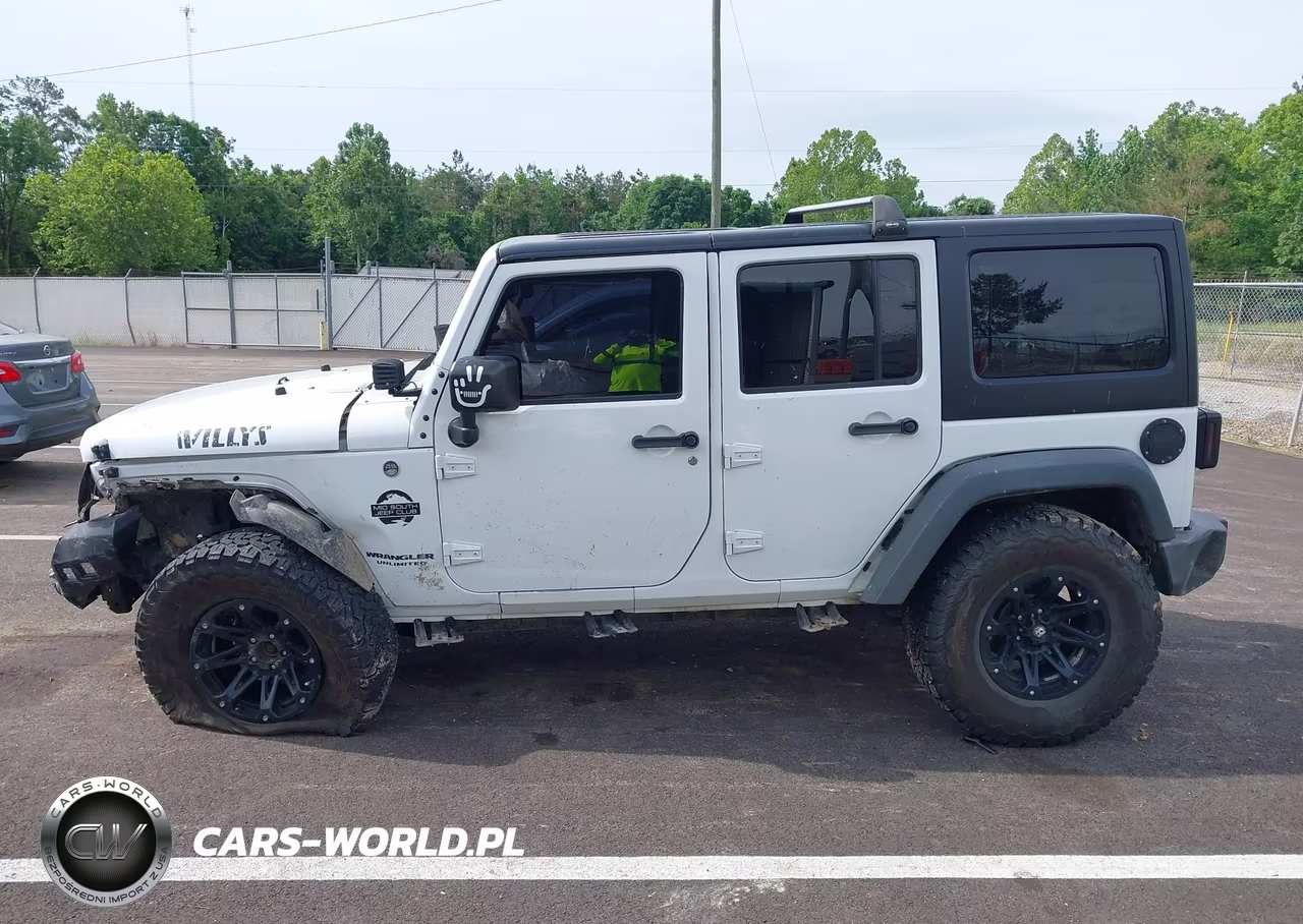 2015 Jeep Wrangler Unlimited Sport VIN:1C4BJWDG1FL633050 - 13