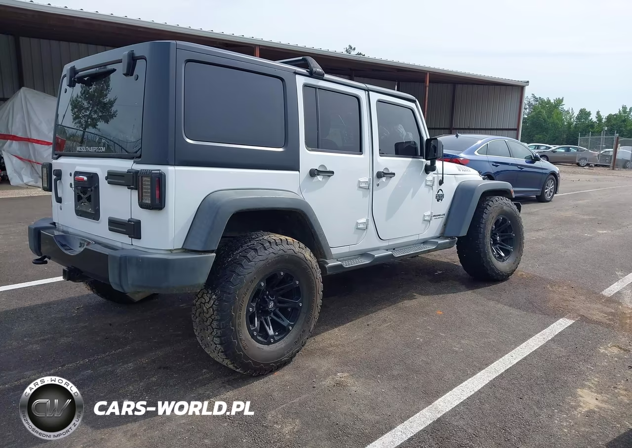 2015 Jeep Wrangler Unlimited Sport VIN:1C4BJWDG1FL633050 - 4