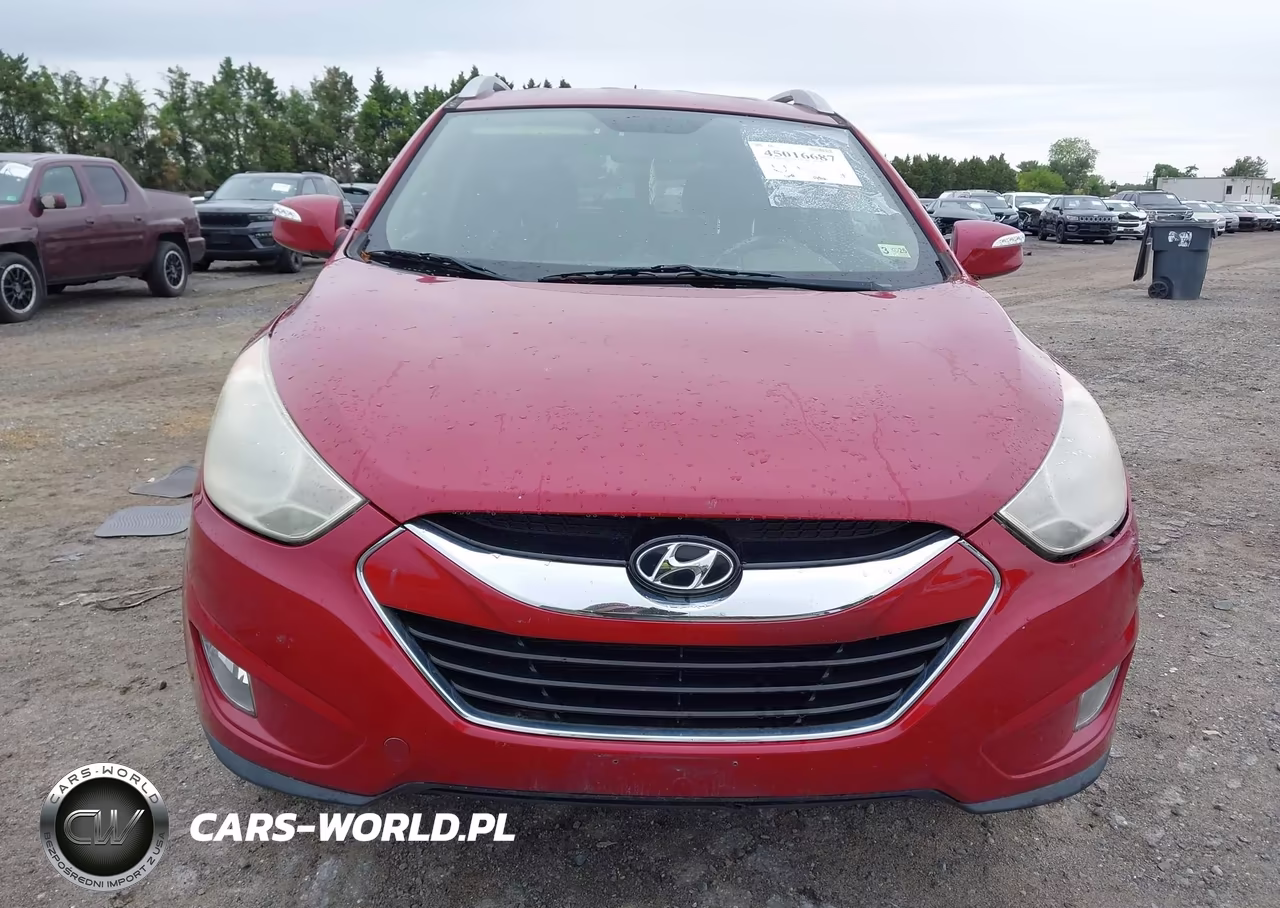 2011 Hyundai Tucson Limited VIN:KM8JUCACXBU311025 - 12