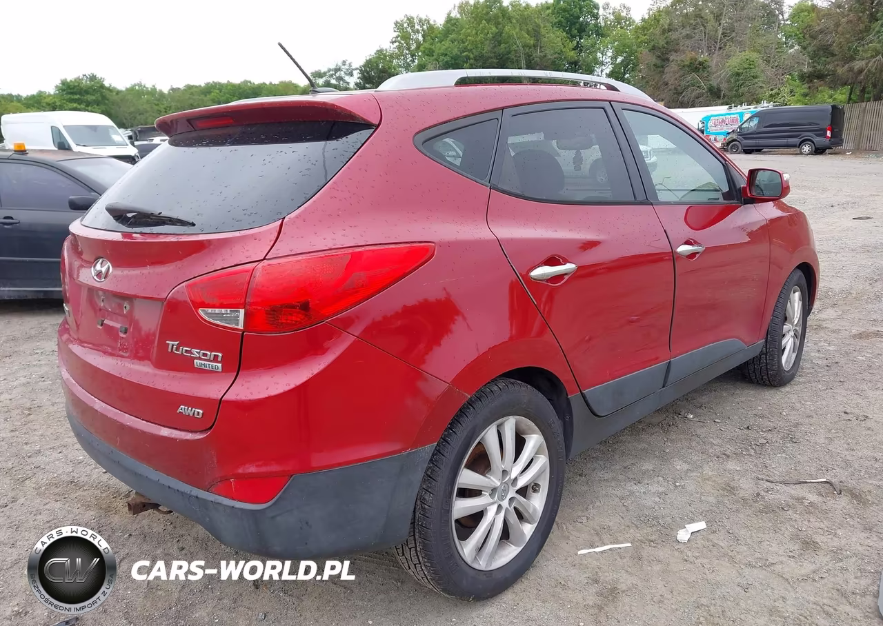 2011 Hyundai Tucson Limited VIN:KM8JUCACXBU311025 - 4