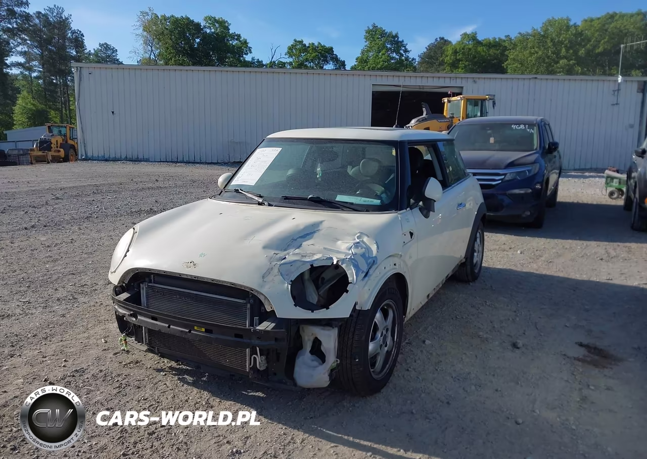 2009 Mini Cooper VIN:WMWMF33579TW75149 - 2