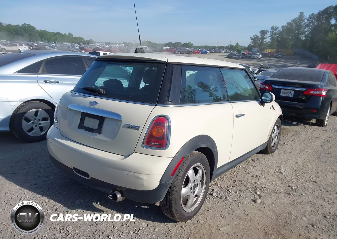 2009 Mini Cooper VIN:WMWMF33579TW75149 - 4