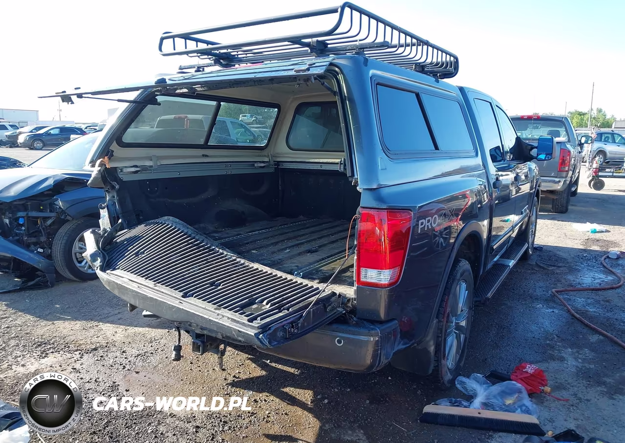 2012 Nissan Titan Pro-4X VIN:1N6BA0EC4CN323352 - 4